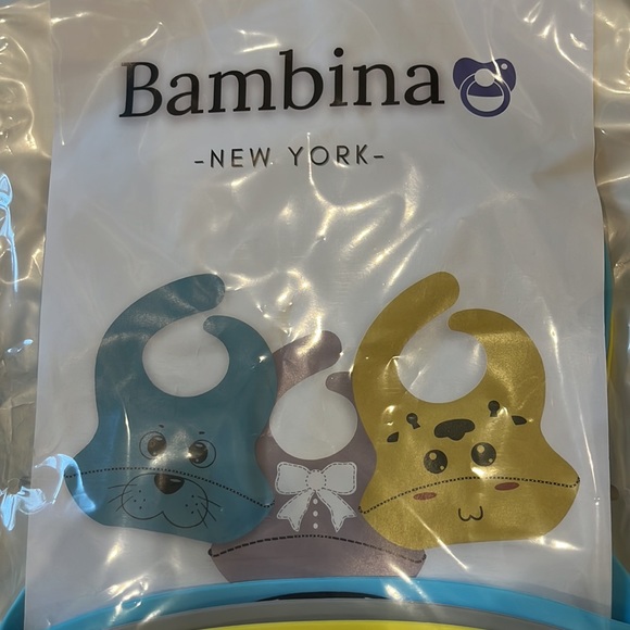 New 3 in a bag baby plastic bibs. One blue one grey one yellow🎉 - Picture 3 of 4